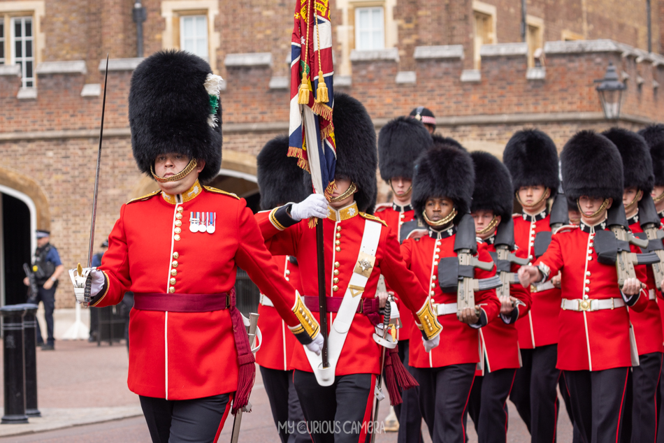 The Irish Guard marching down the street beside St James Palace