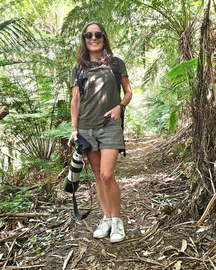 Nina in the bush with Canon R5 camera and 100-400mm lens