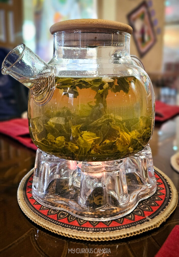 Green Tea in a traditional pot with warmer