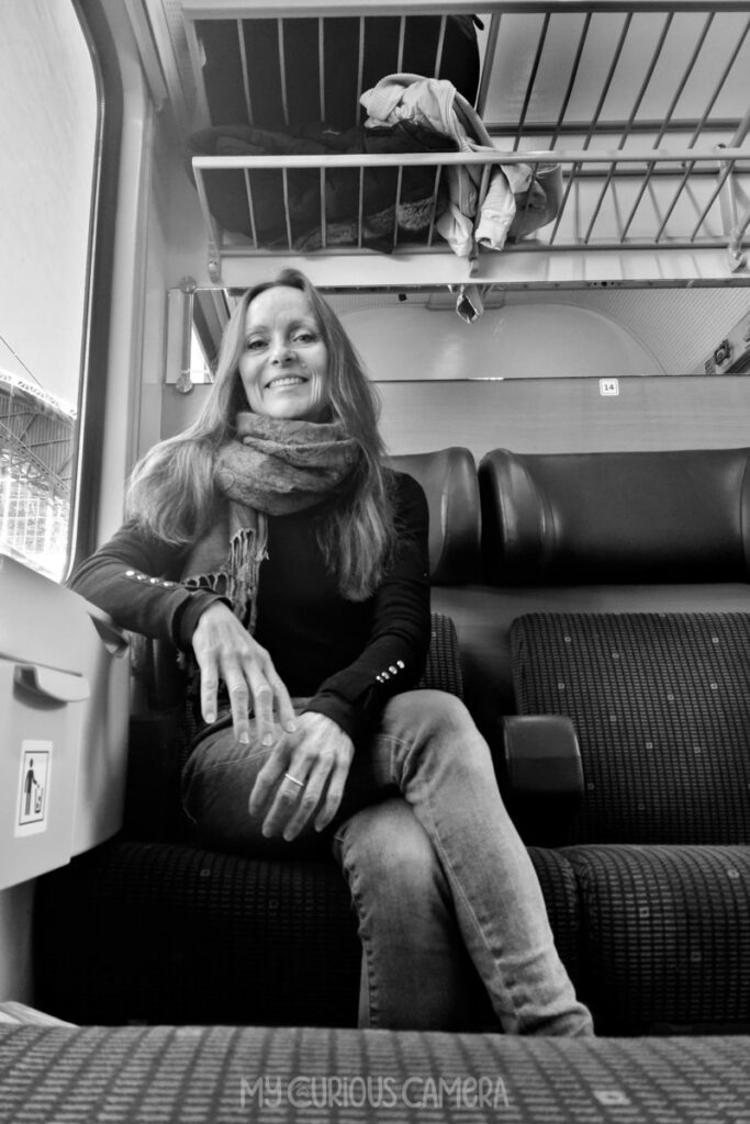 Nina solo adventuring through Europe. On a train from Salzburg